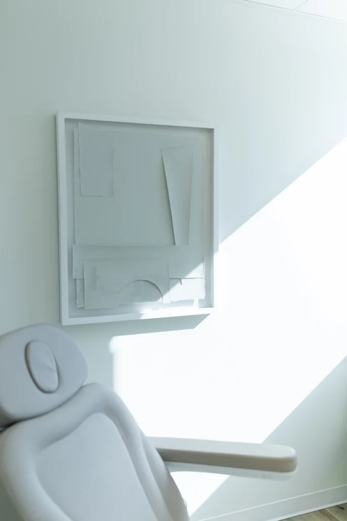 a white framed art on a white wall, Chemical Peels in Brentwood, TN